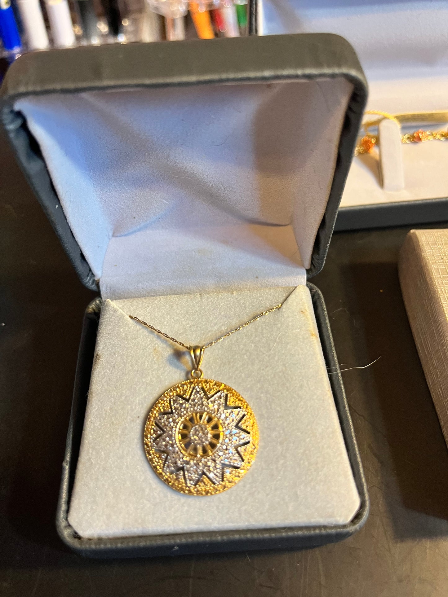 14 K Axtec Calender Necklace